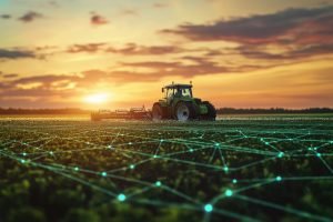 Advanced Agritech Tractor at Sunset on Smart Farm with Network Visualization.